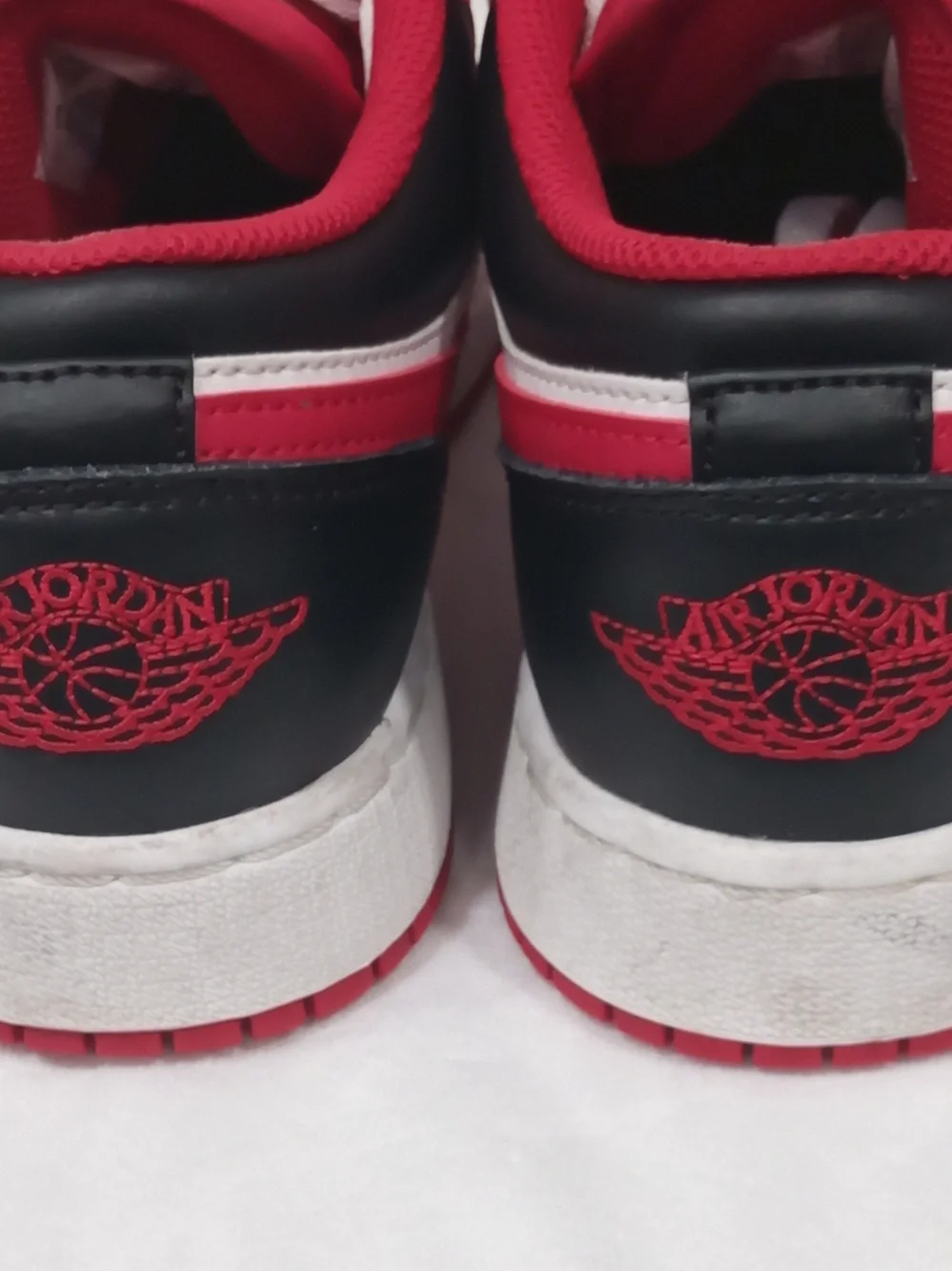 Nike Air Jordan 1 Low Grade School Sneakers. (